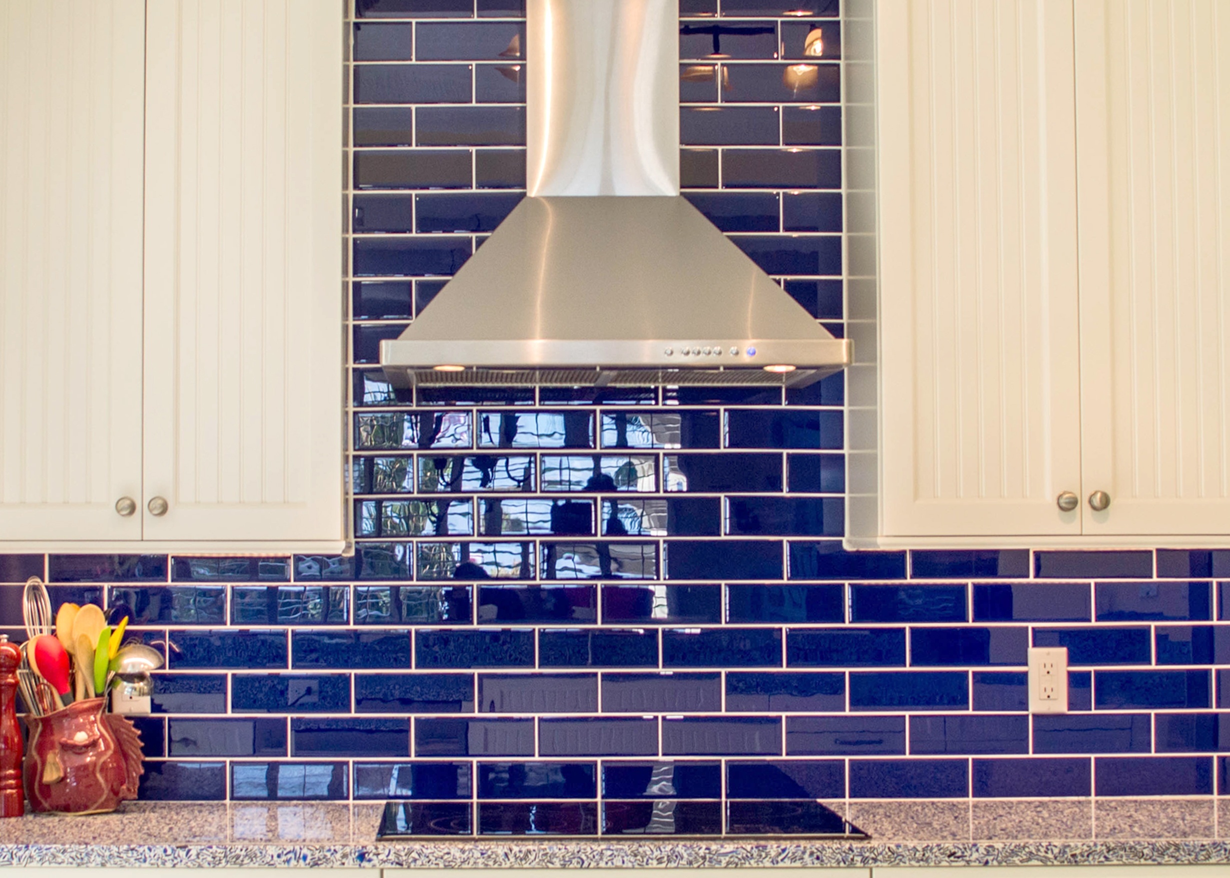 featured_5vetrazzo-recycled-glass-in-cobalt-skye-for-countertops-and-creative-kitchen-storage-by-waterview-kitchens-close-up-of-cobalt-tile