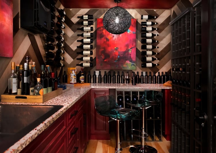 This home's wine room is bold in color and patterns designed by the Queen of Color Rachel Moriarty Interiors 