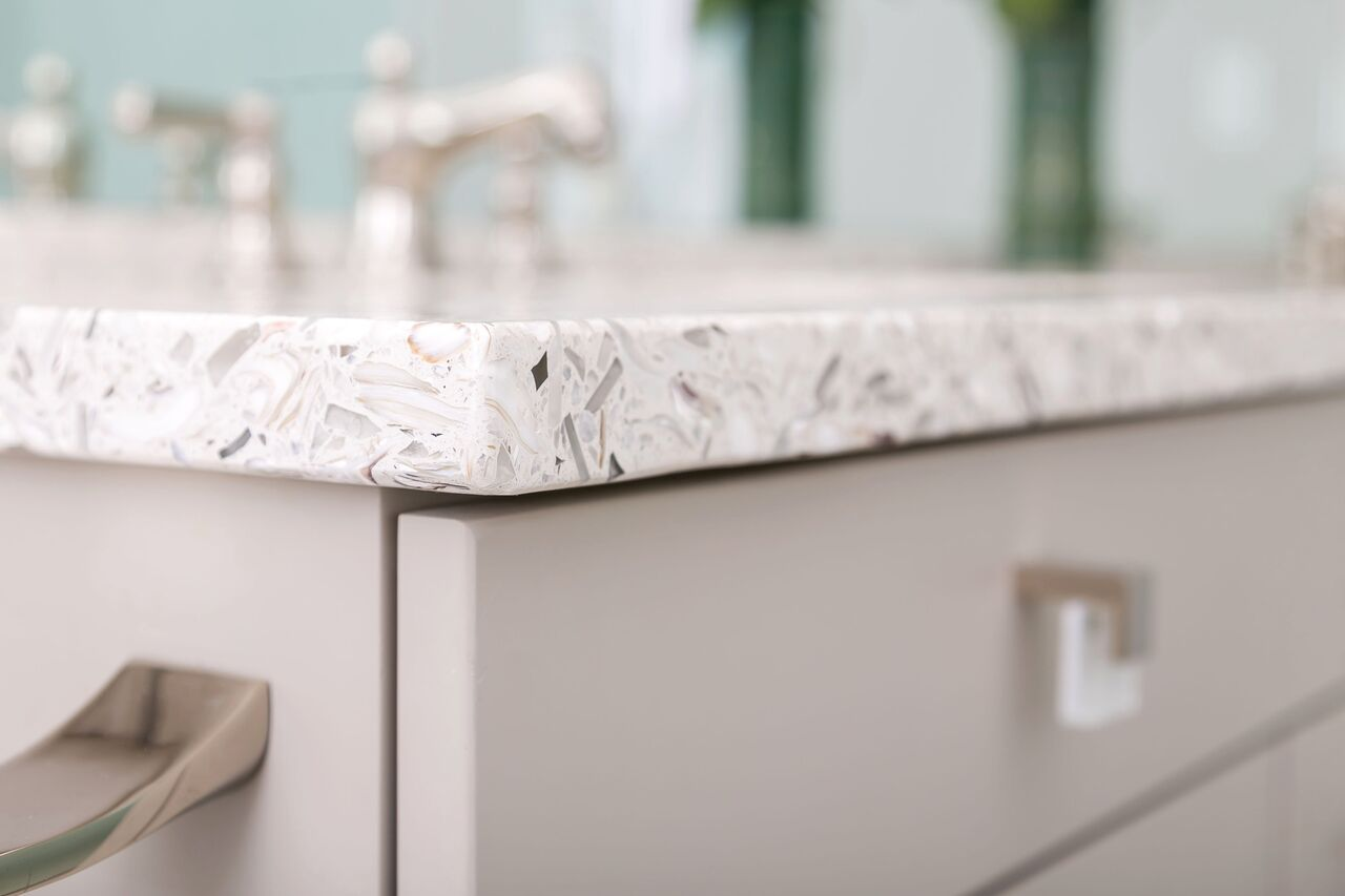 Recycled glass counter tops for a coastal inspired bathroom remodel